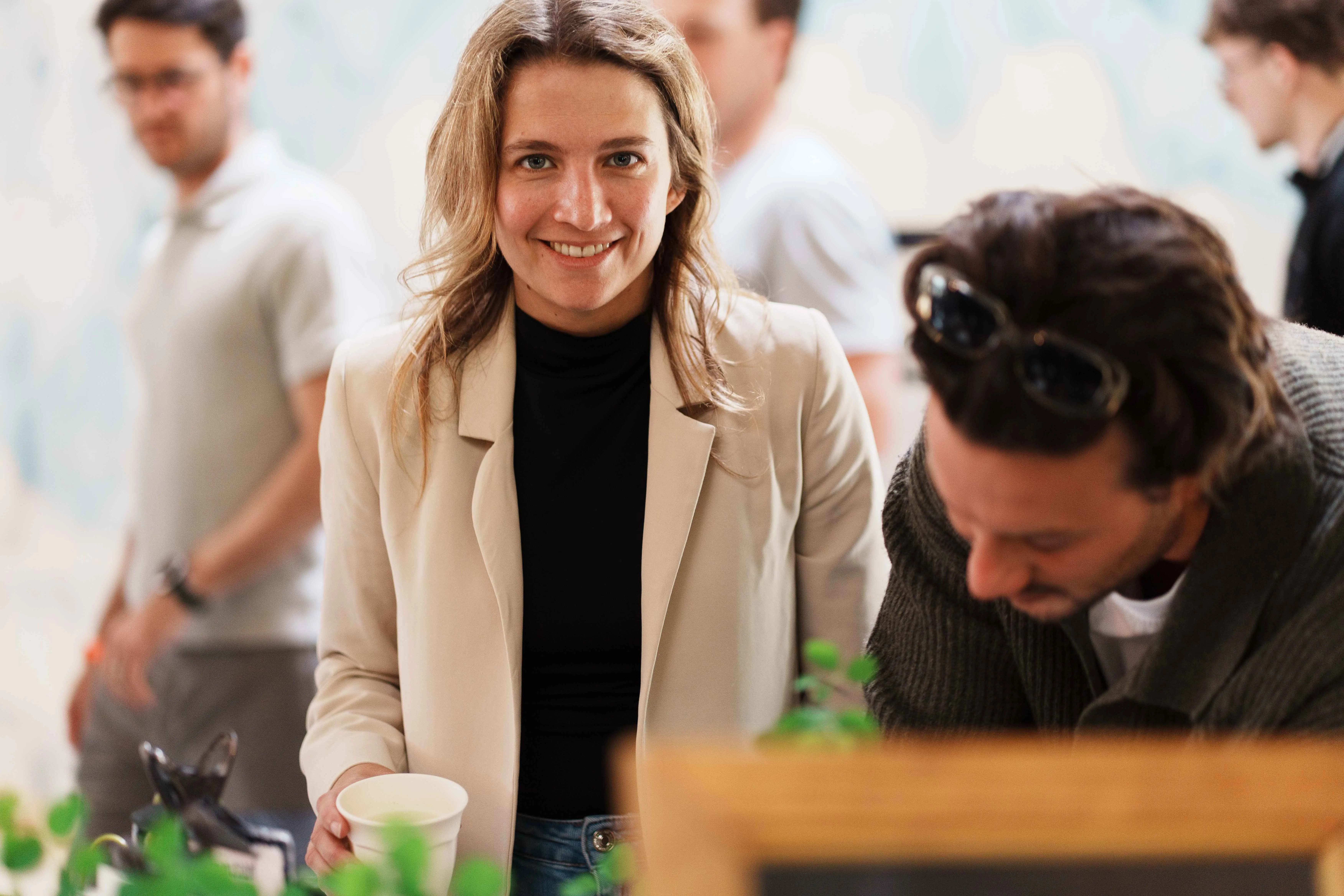 Group of colleagues walking and laughing after a sports activity
